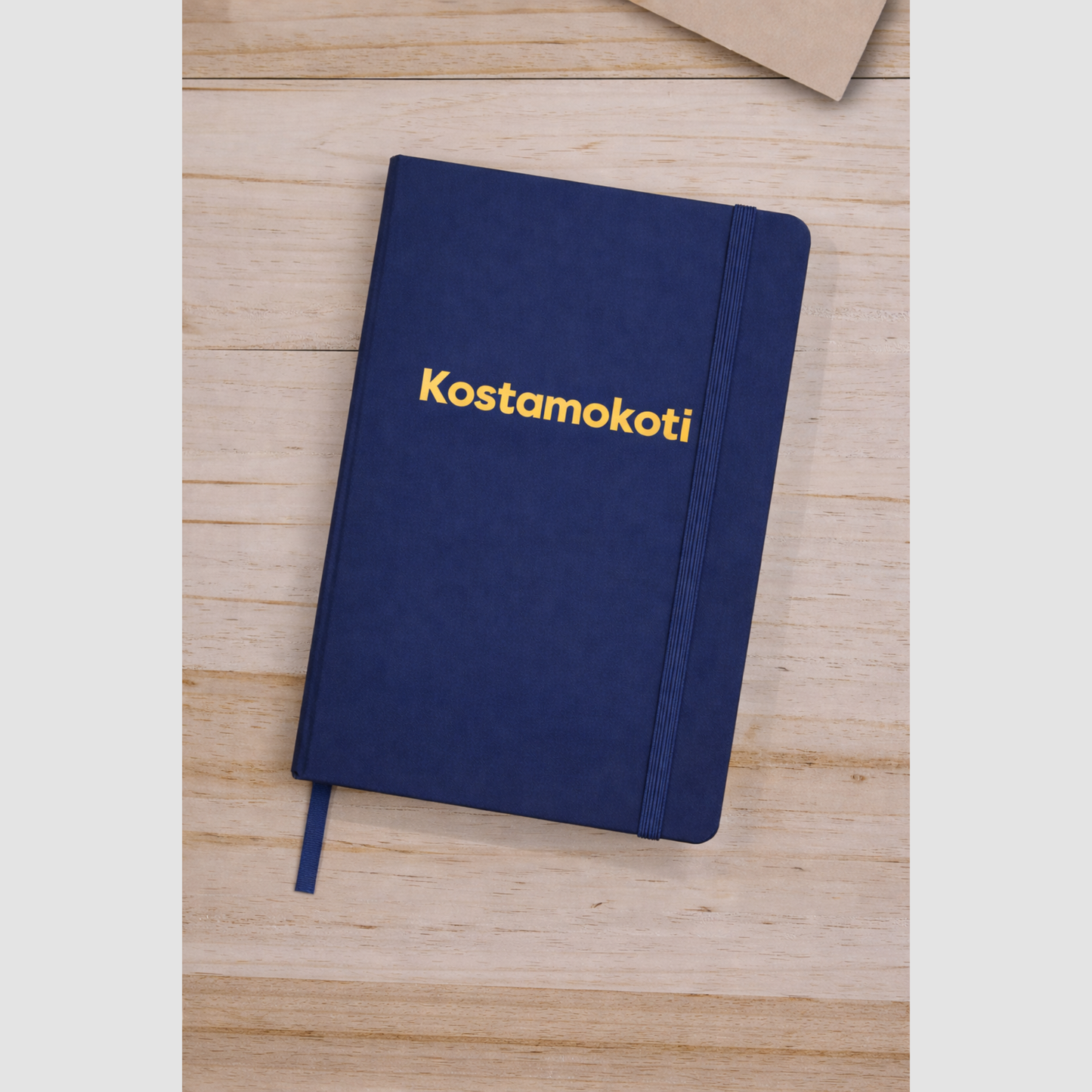 Spectrum-muistikirja Kostamokoti Logolla, koko A5, kovakantinen
